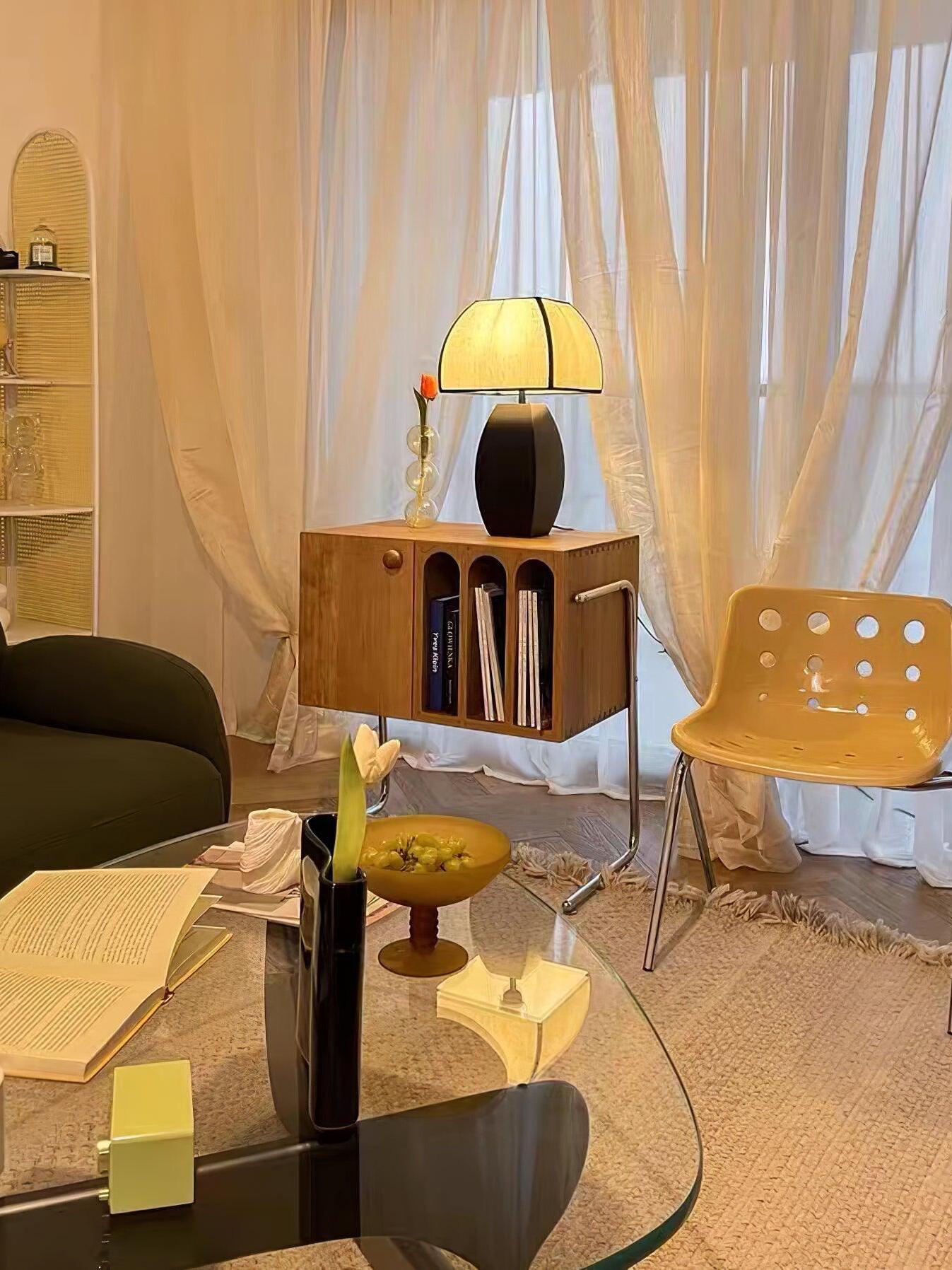 Javier table lamp by living room curtain