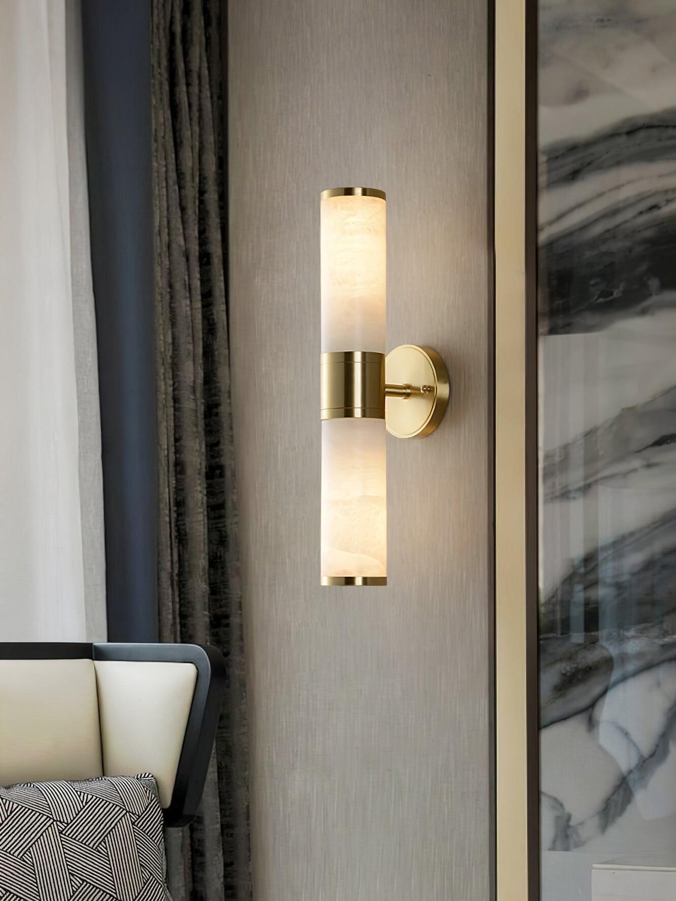 Tall double-ended brass and white stone wall lamp