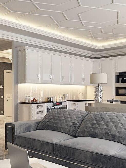 Tiered hanging chains above a grey sofa