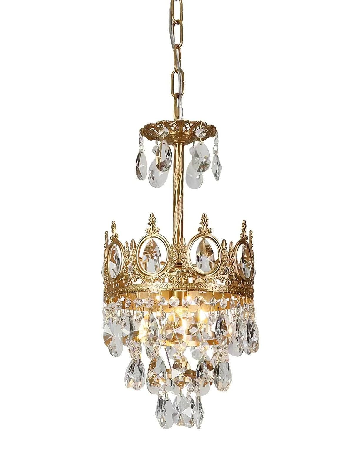 Compact crystal chandelier with an upper drop-trimmed disc, central stem, ornate crown and tapered clear drops