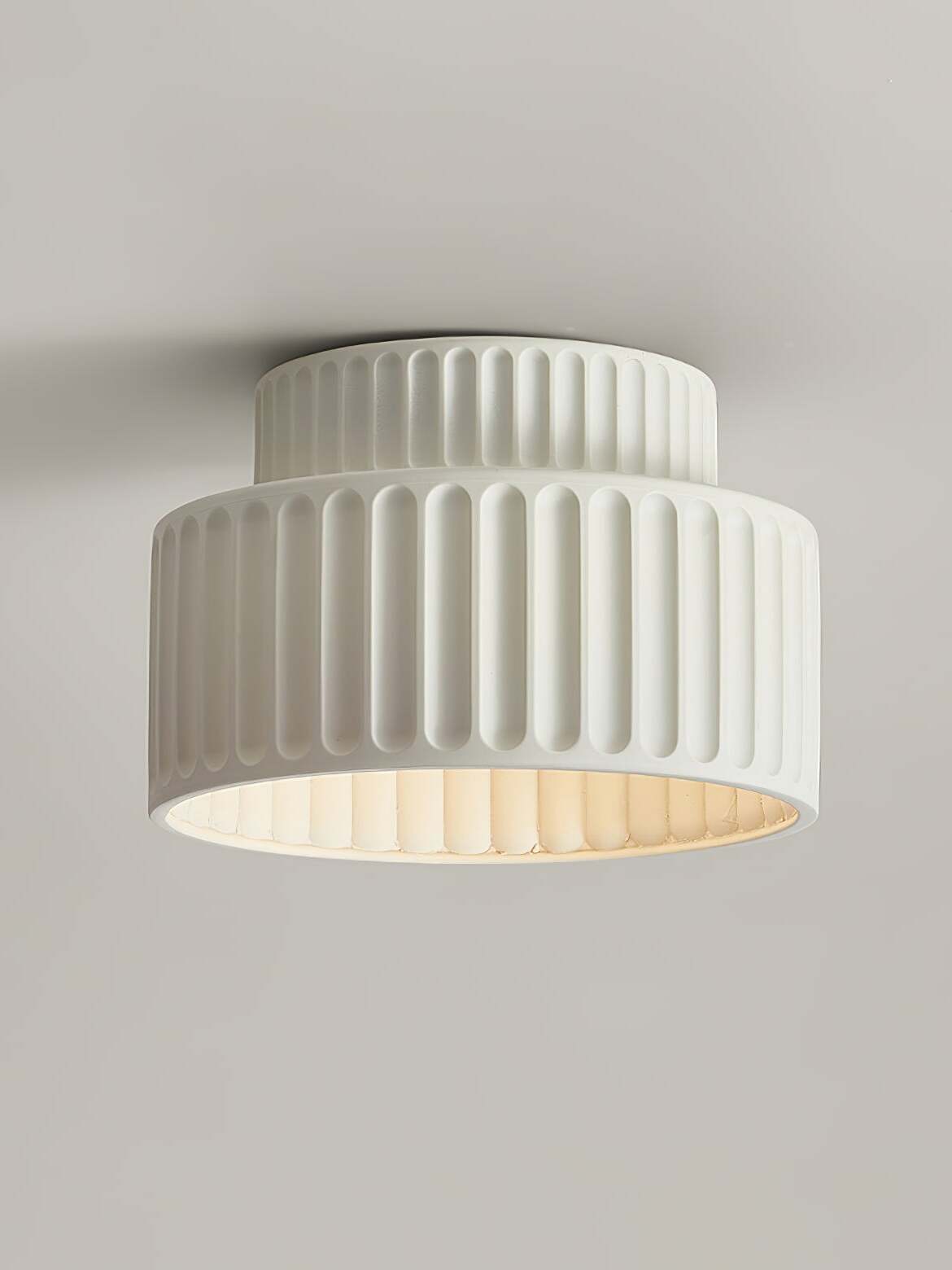 White Kami ribbed ceiling light seen from below