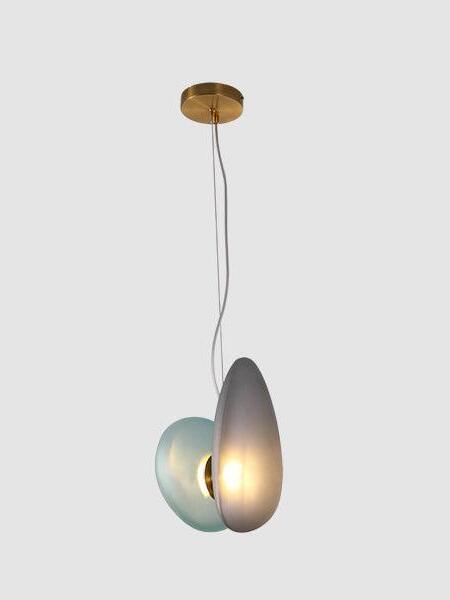 Model 1 blue and smoky-grey pebble pendant on pale background