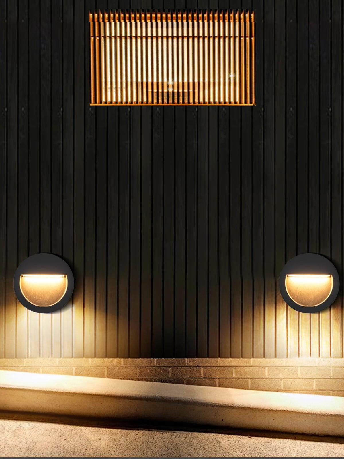 Pair of round lights below slatted wall
