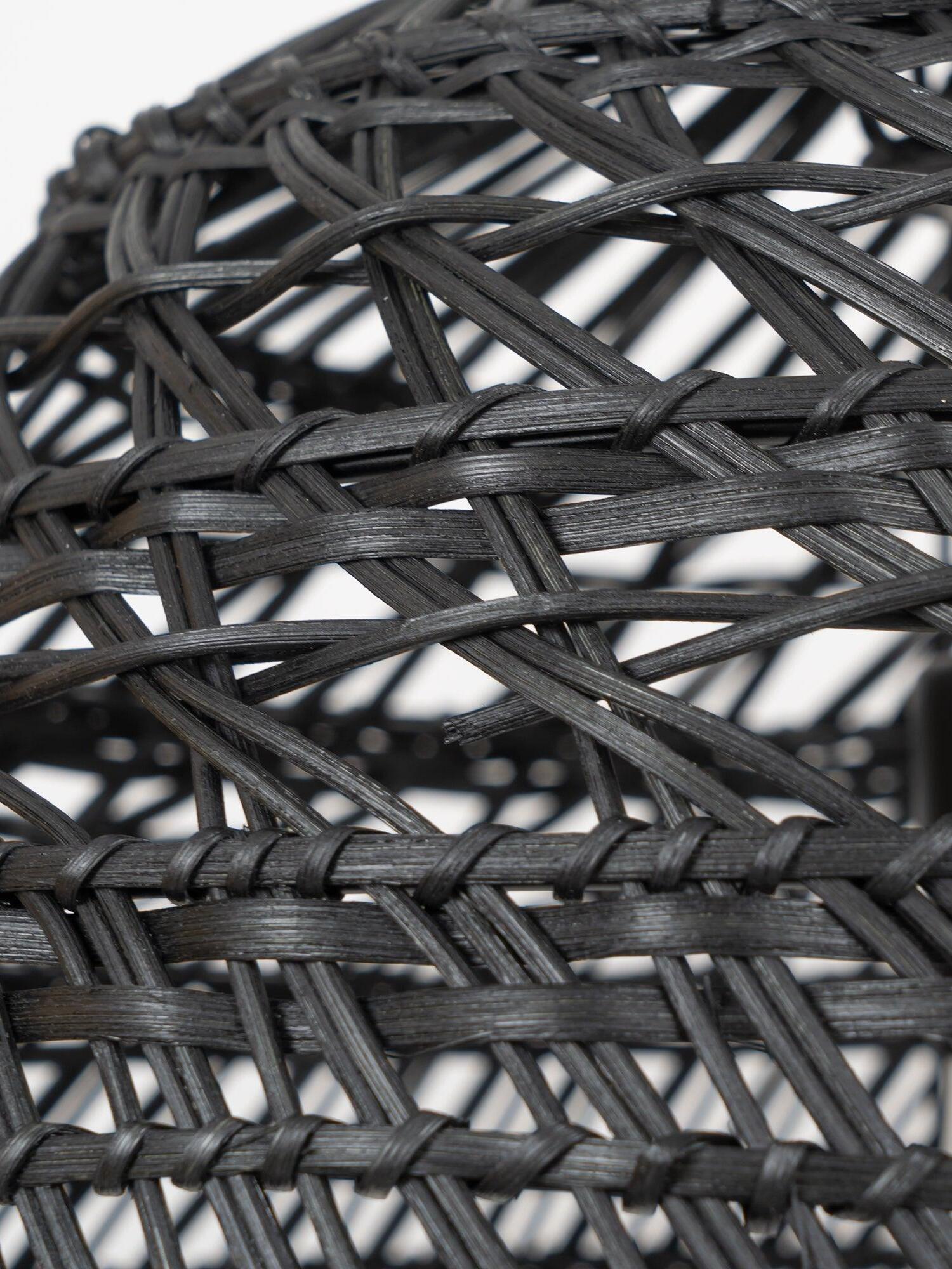 Close-up of Black woven strips and supporting ribs