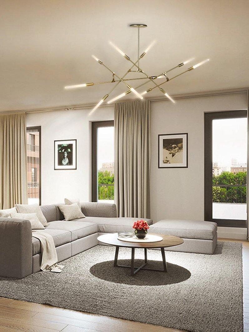 Gold ceiling fixture in a neutral living room