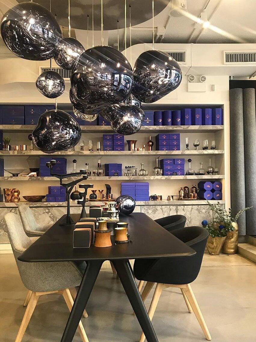 Dark reflective shades over a dining setting