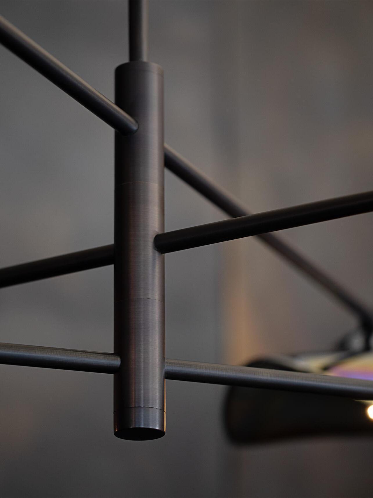 Close view of Black central column and arm joints