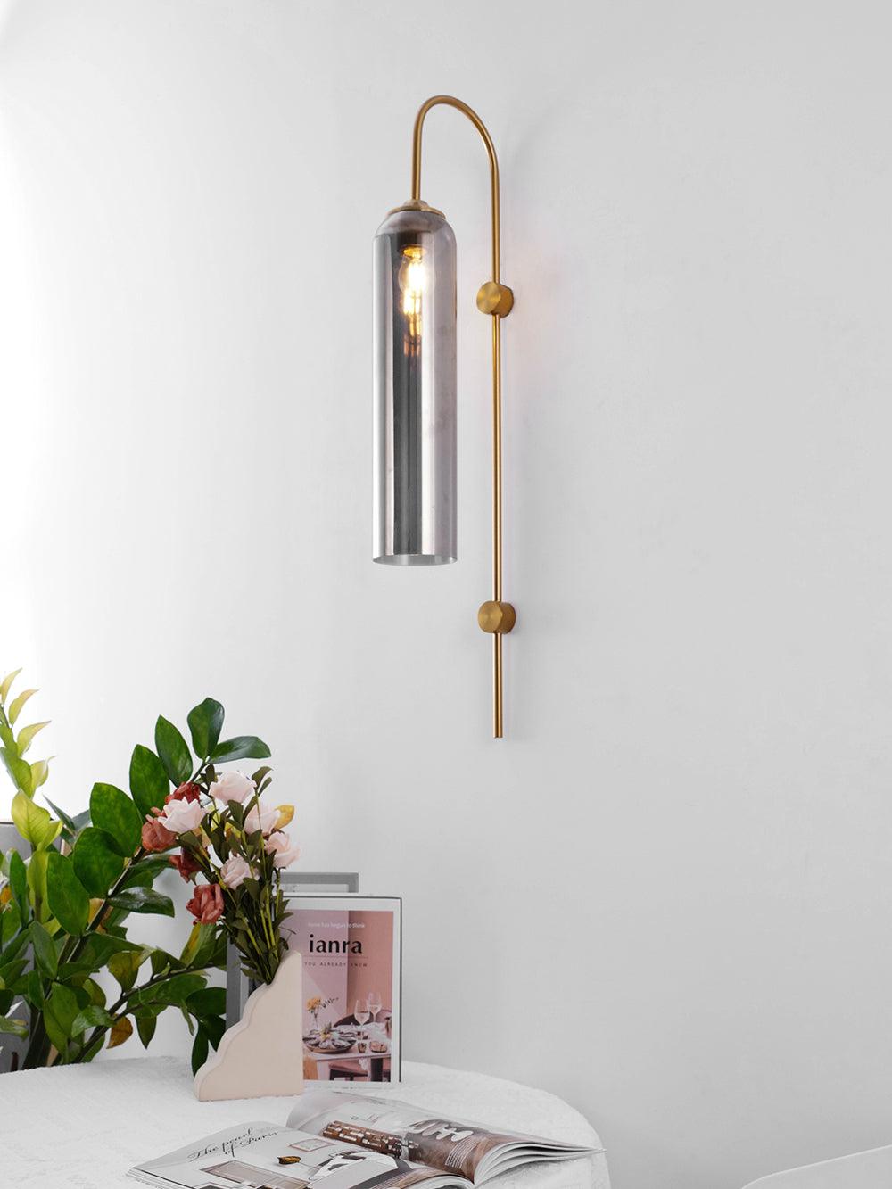Grey-toned glass wall shade above a tabletop