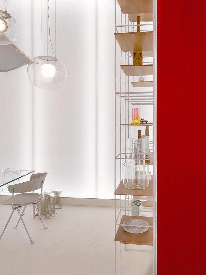 Glass pendant in a bright room with open shelving
