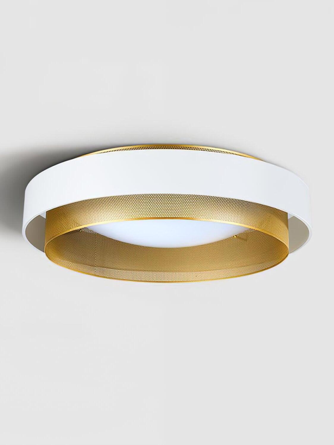 White Nolan ceiling-light band around a perforated gold ring and central diffuser