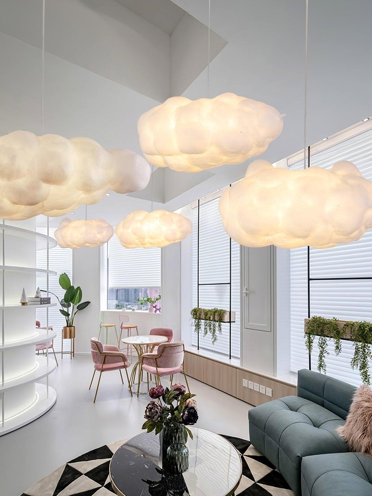Cloud pendants above a seating and dining space