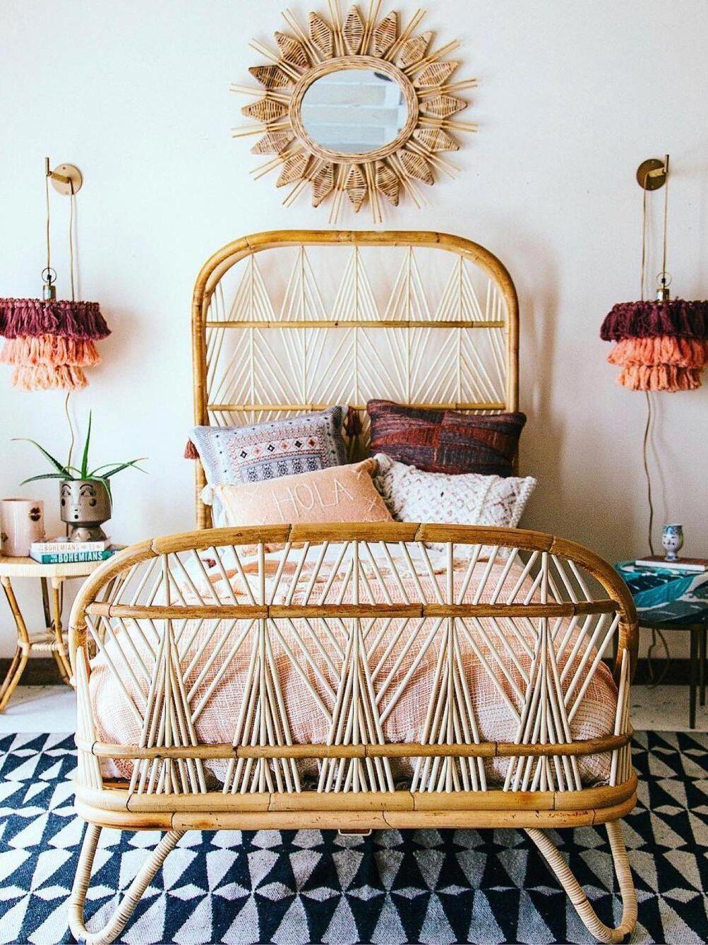 Multicolour tassel pair beside a rattan-style headboard