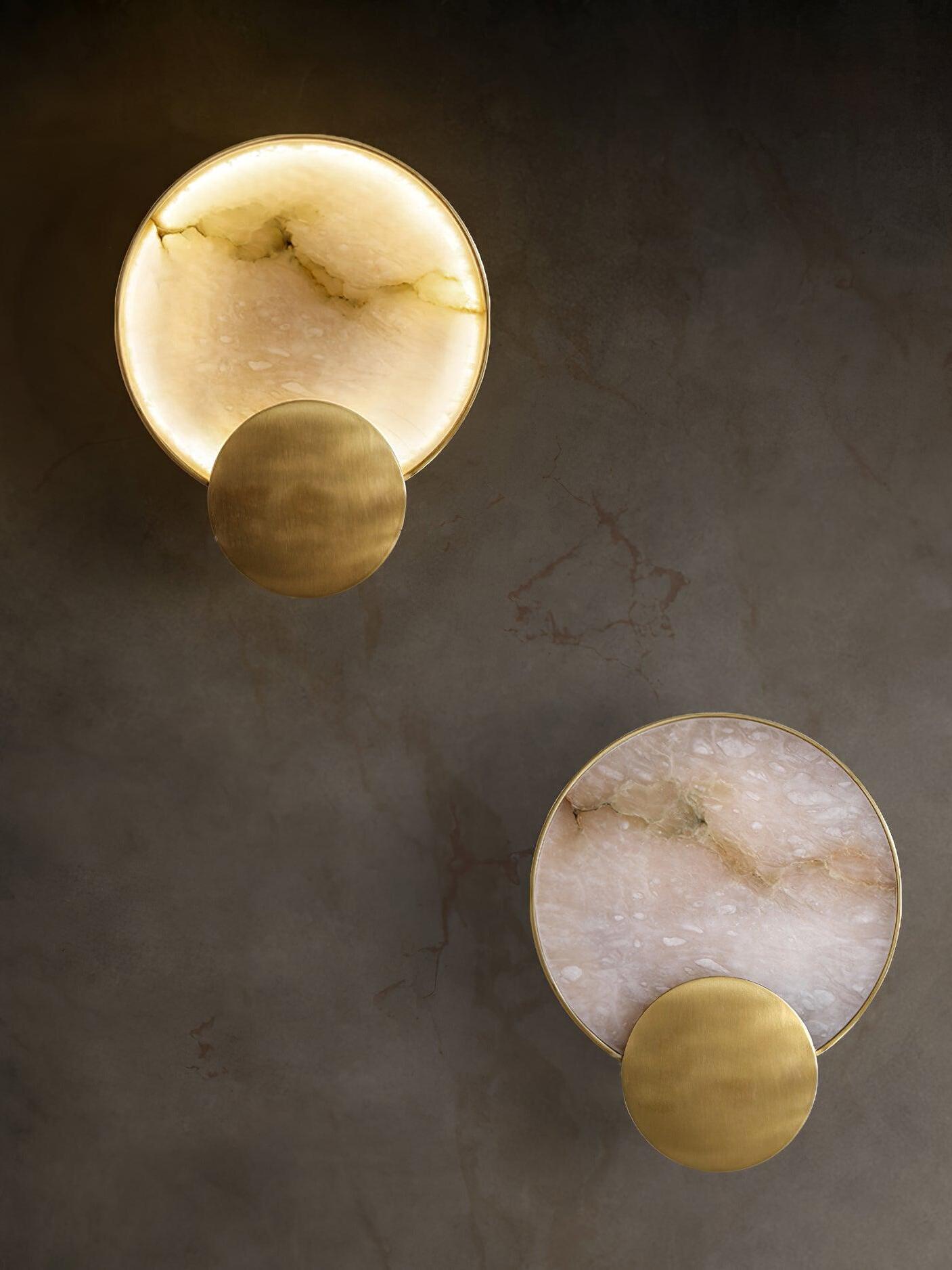 Lit and unlit Terra Svet fixtures with differing stone patterns