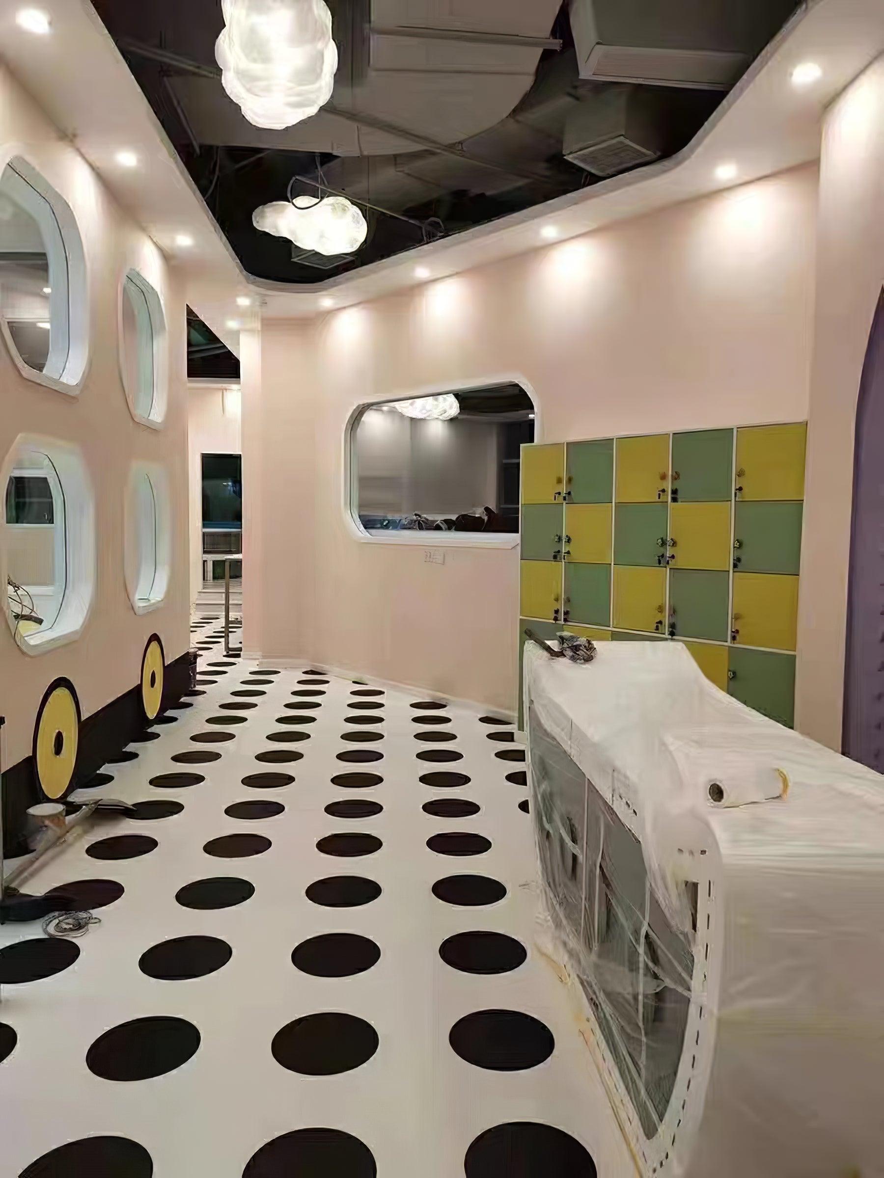 Cloud-shaped lights in a patterned bathroom scene