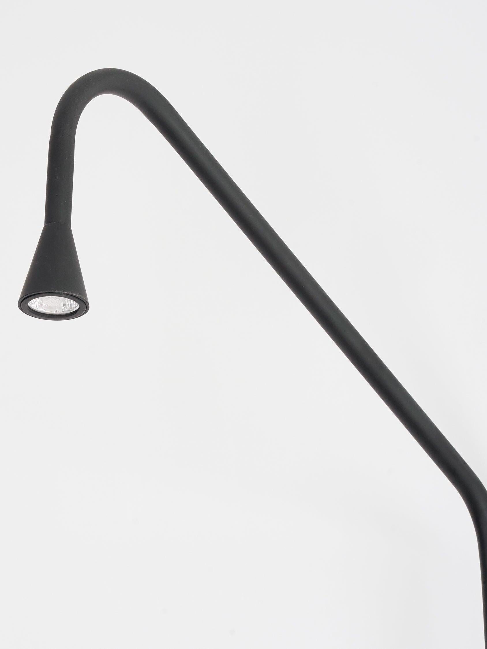 Black angled arm and down-facing head detail