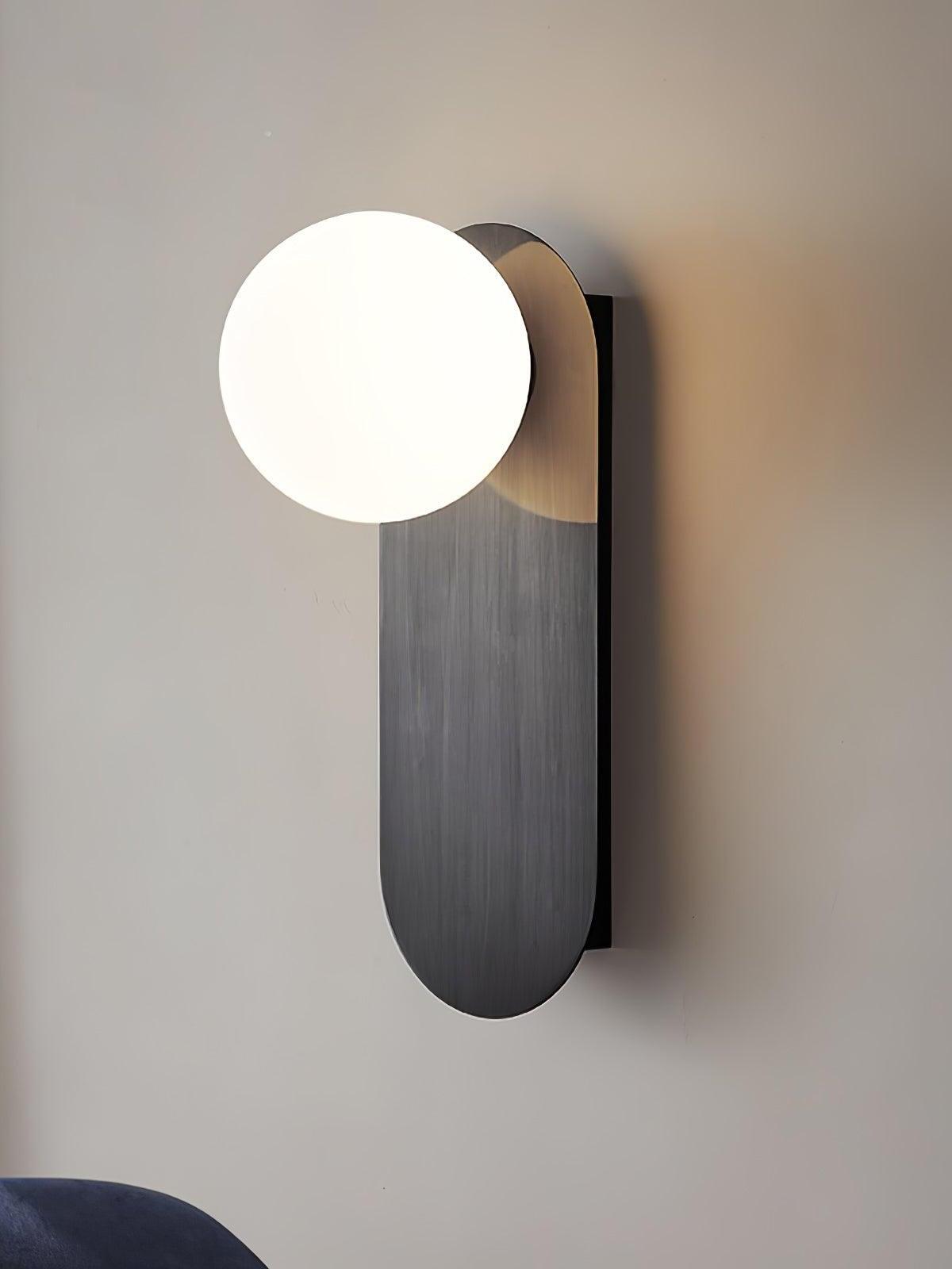 Close view of lit White globe and tall Black plate