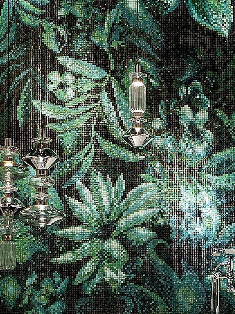 Glass pendants against a green patterned backdrop