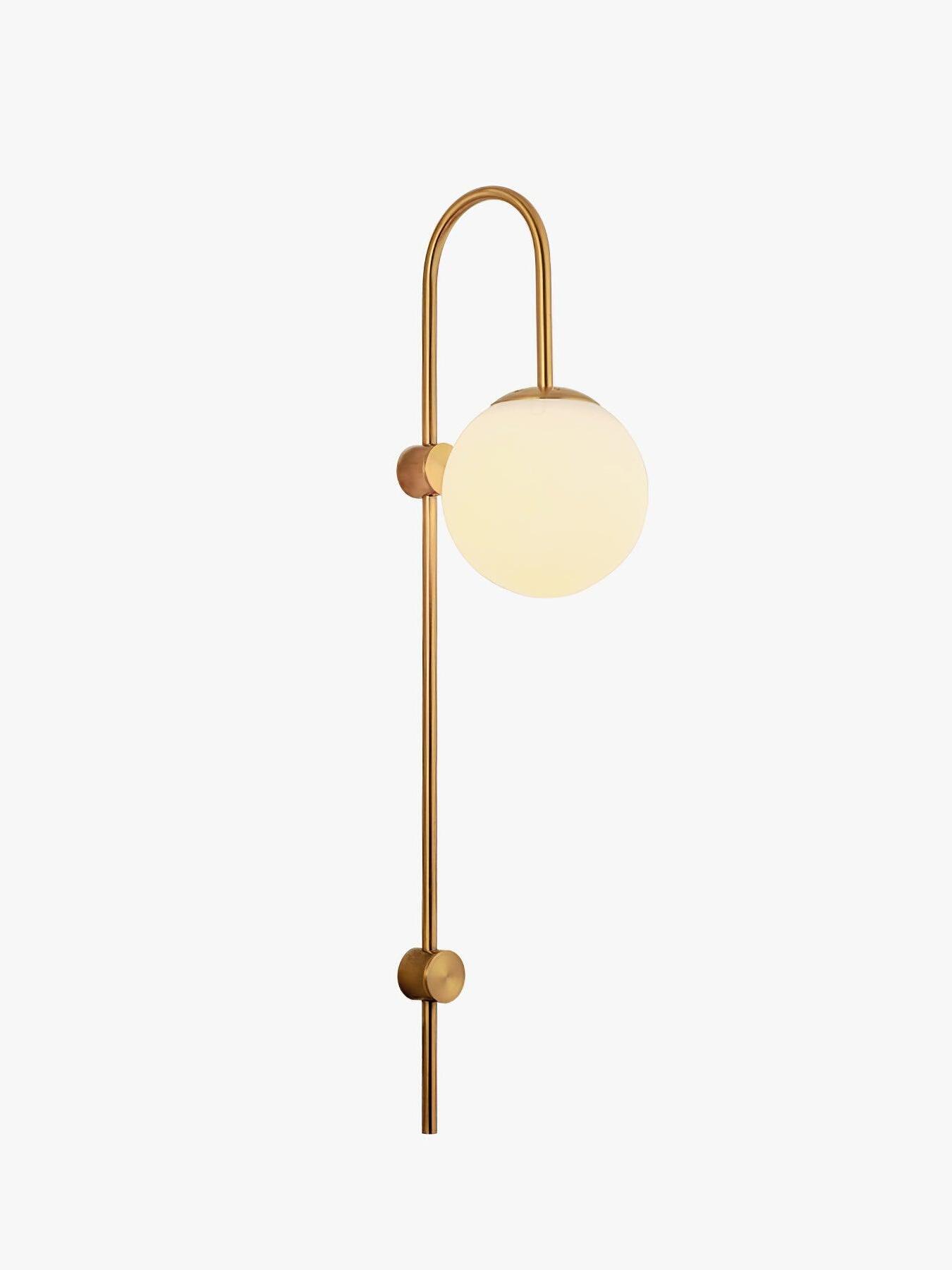 Single gold wall sconce with U-shaped top and white globe
