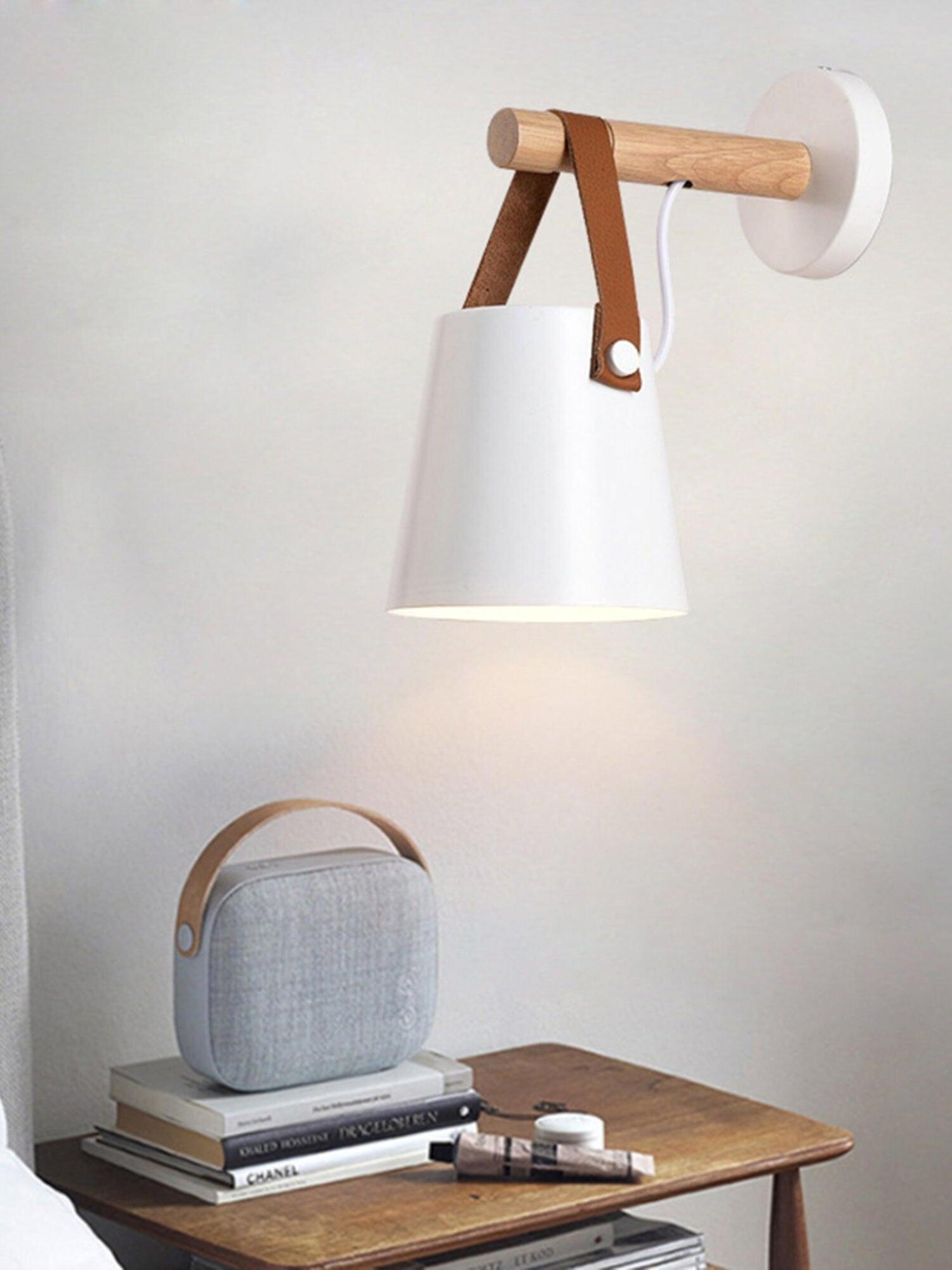 White hanging wall shade above a small table