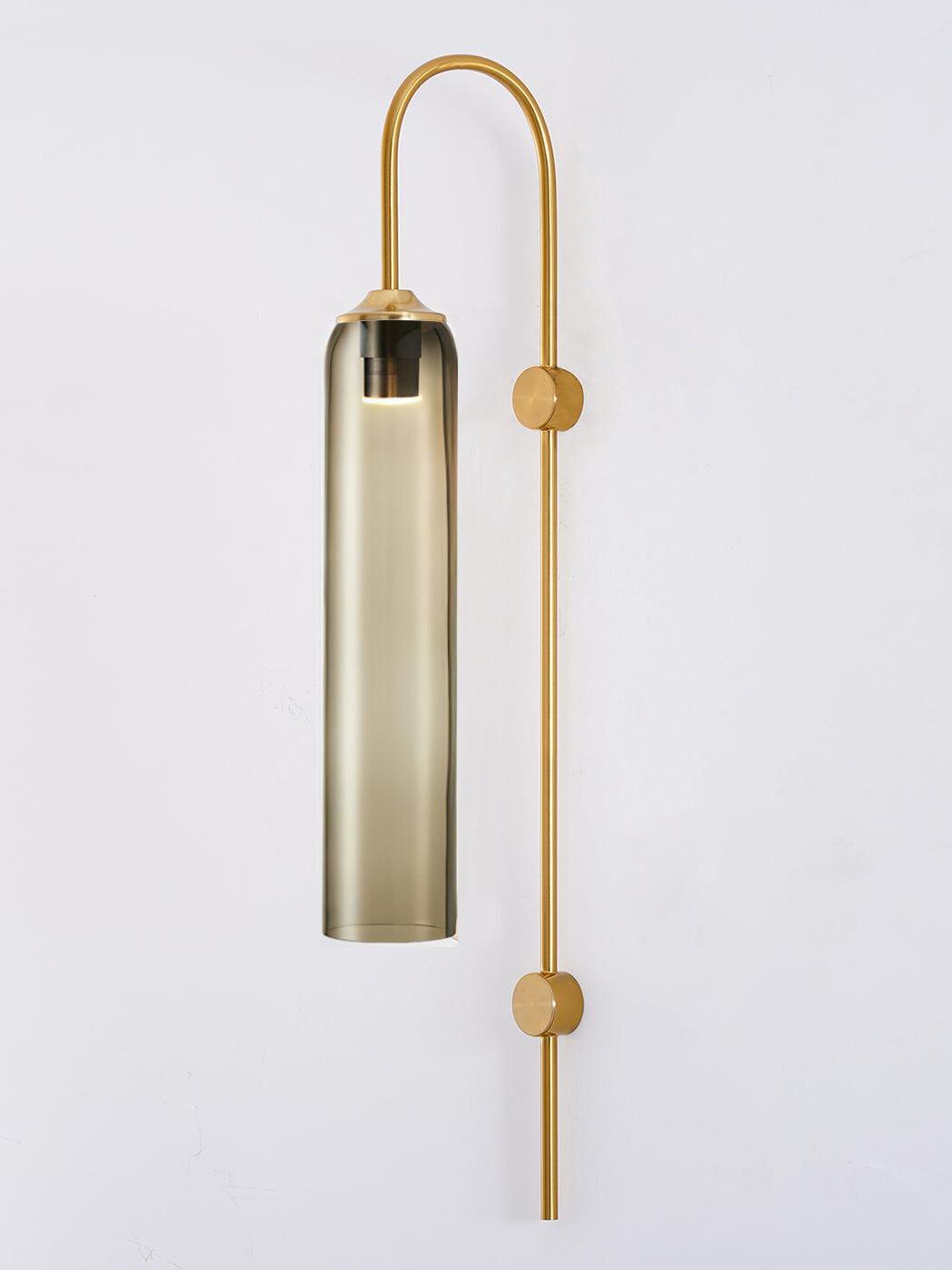 Amber-toned glass cylinder on a gold-coloured stem