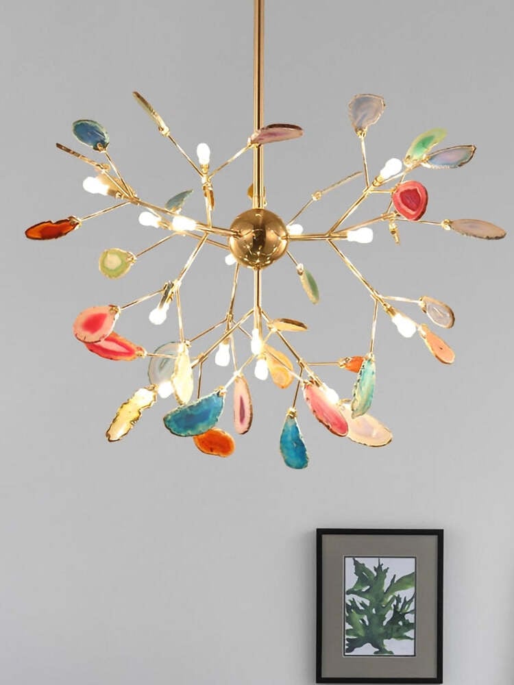 Multicoloured radial chandelier lit in an interior