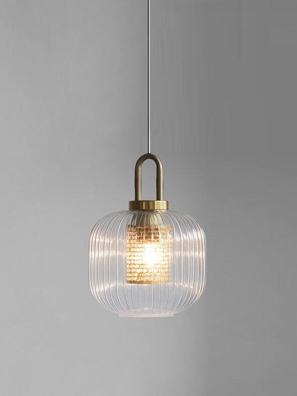 Compact rounded Covent pendant with a glowing centre and gold-coloured loop