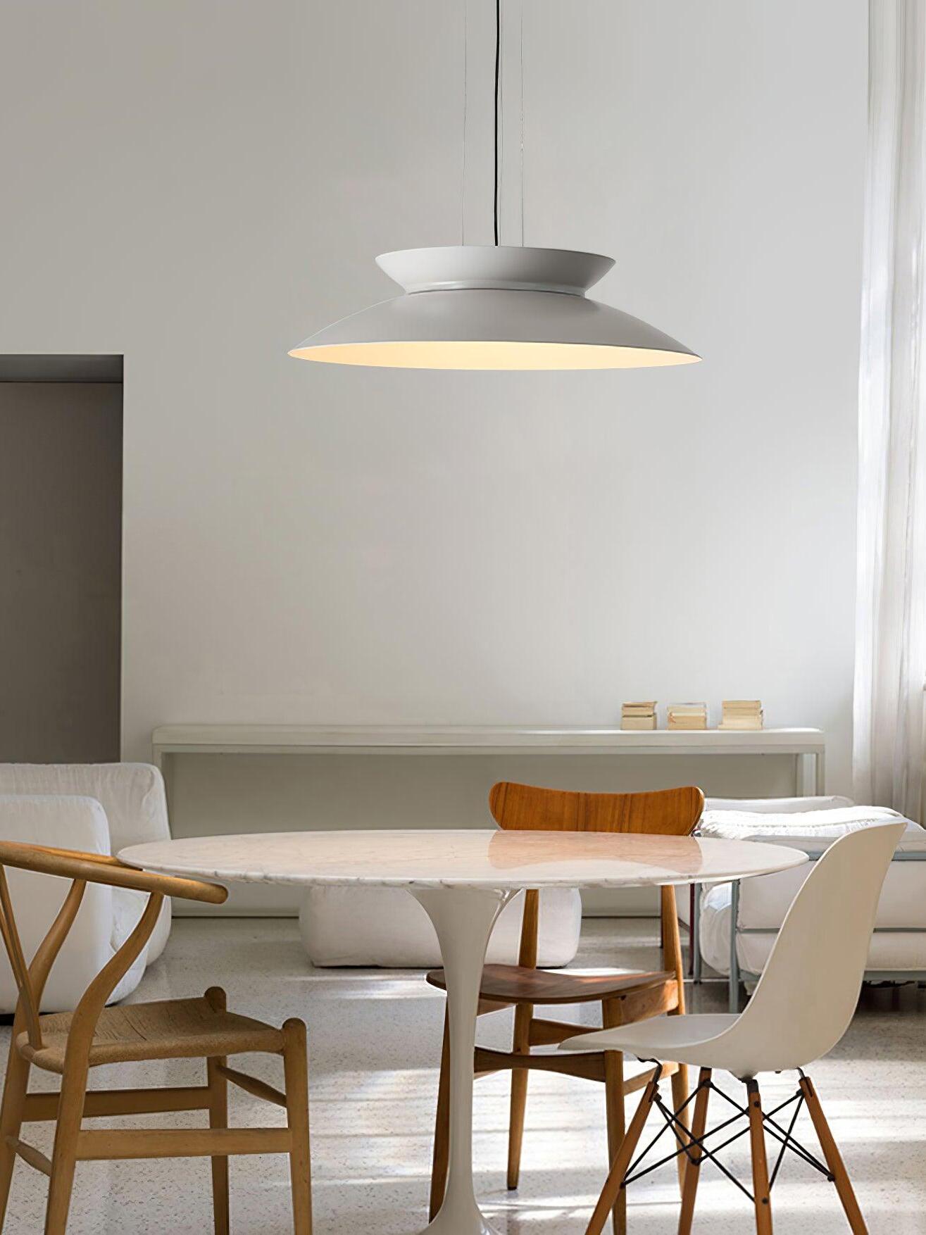 Pale Cetra pendant above light dining table