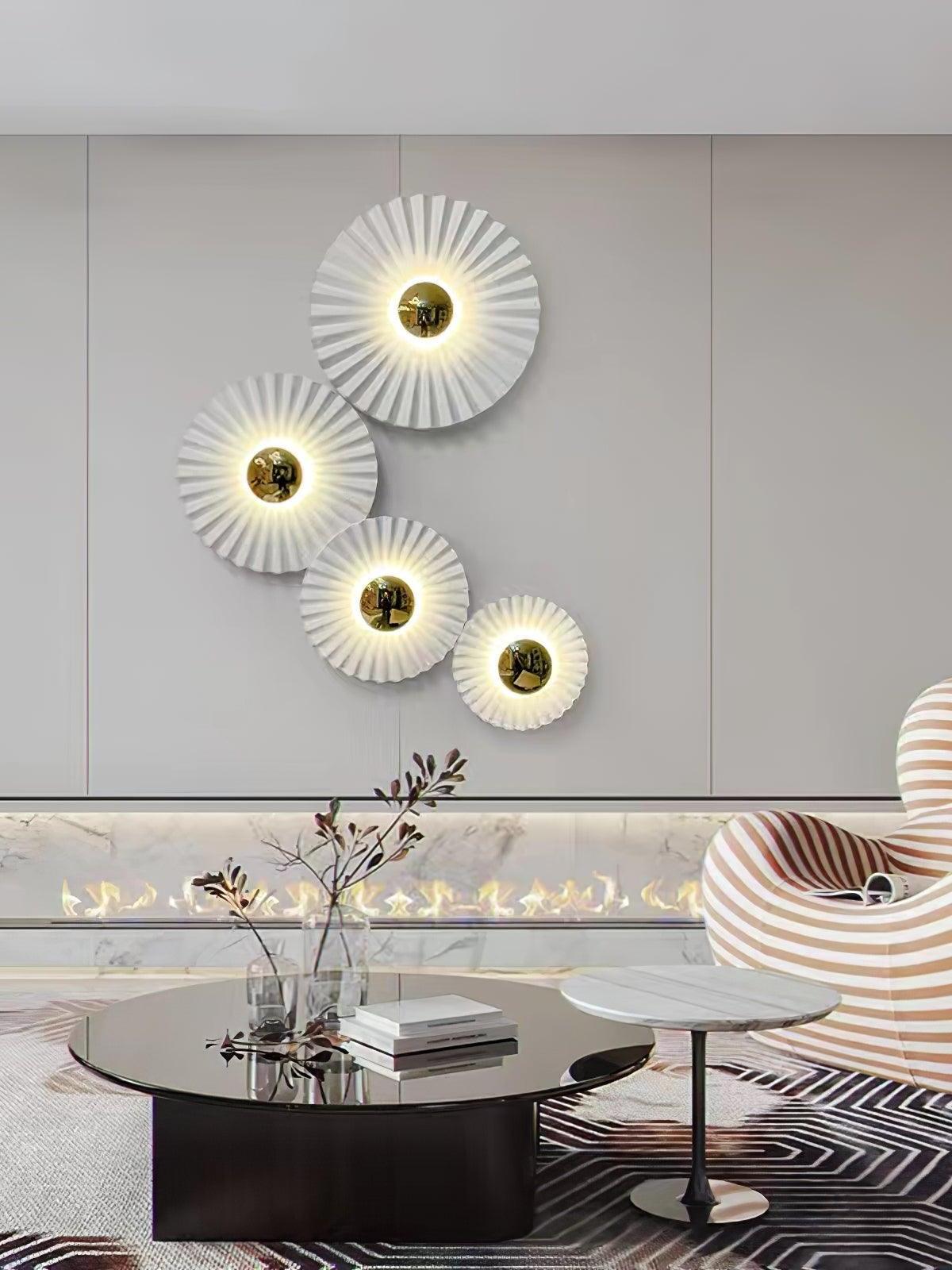Four radial wall lights above lounge seating