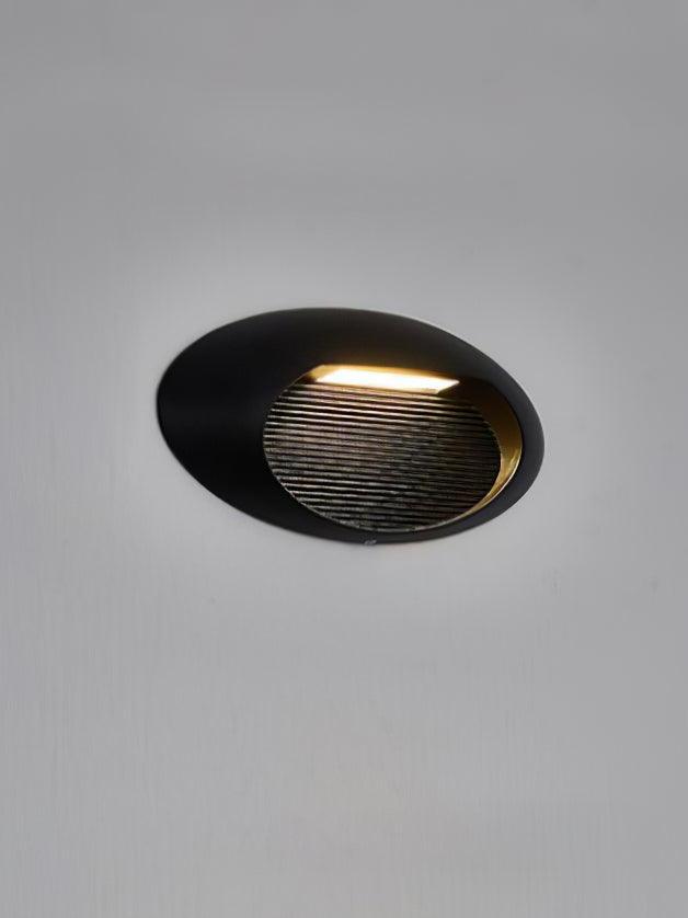 Wide round black unit with illuminated slot
