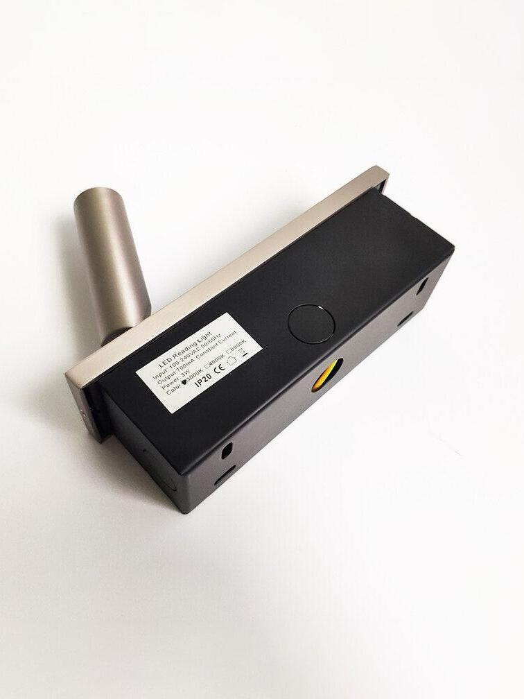 Rear housing and printed rating label of a reading light