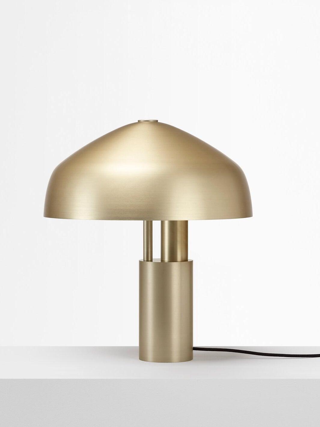 Gold dome lamp shown nearly level with cord