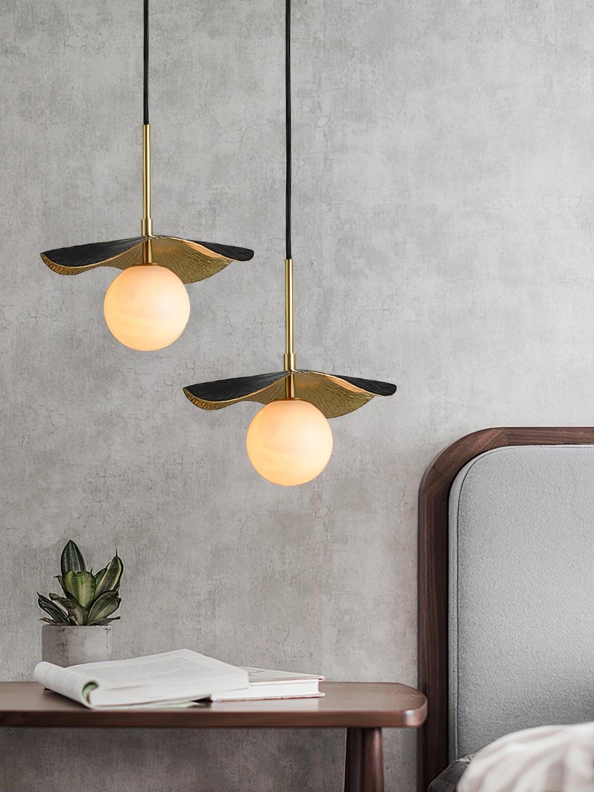 Two separate Montera pendants beside bedroom wall