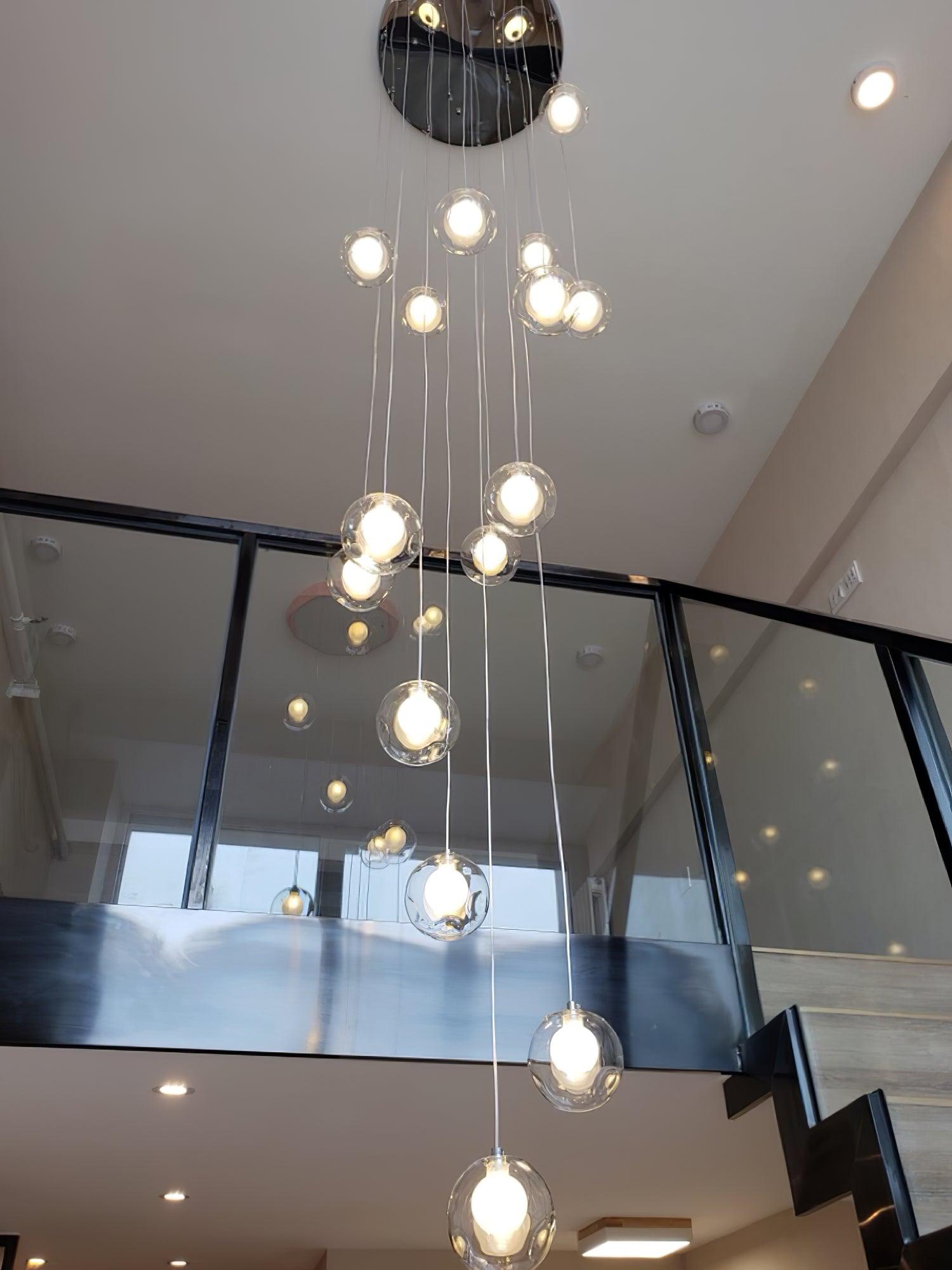 Clear globes seen from below in stair opening