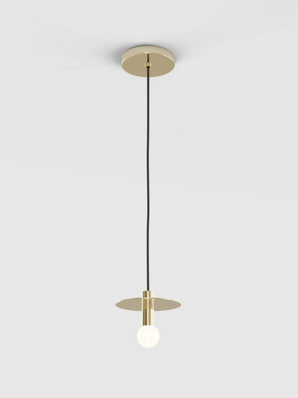 Brass-tone disc pendant with matching round canopy, black cord and exposed globe bulb