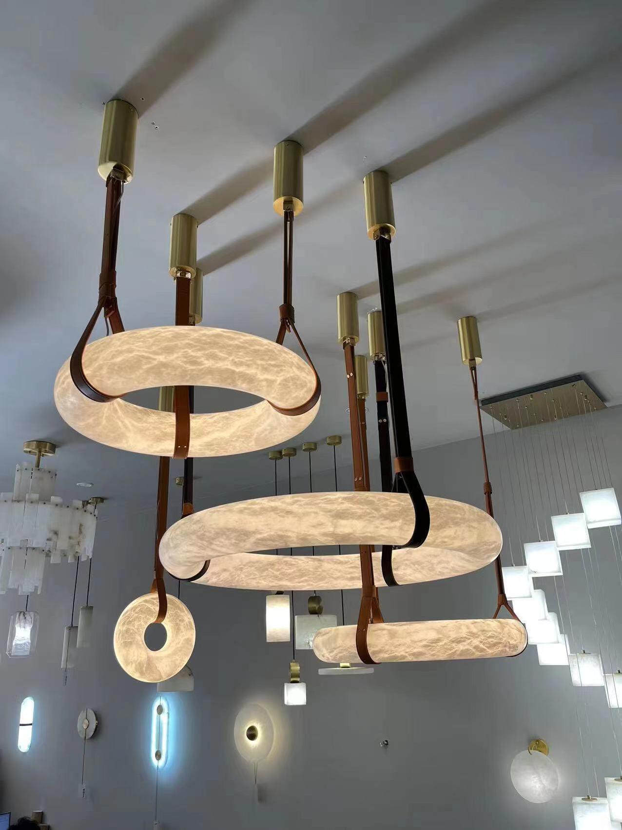 Horizontal ring lights at staggered stairwell heights