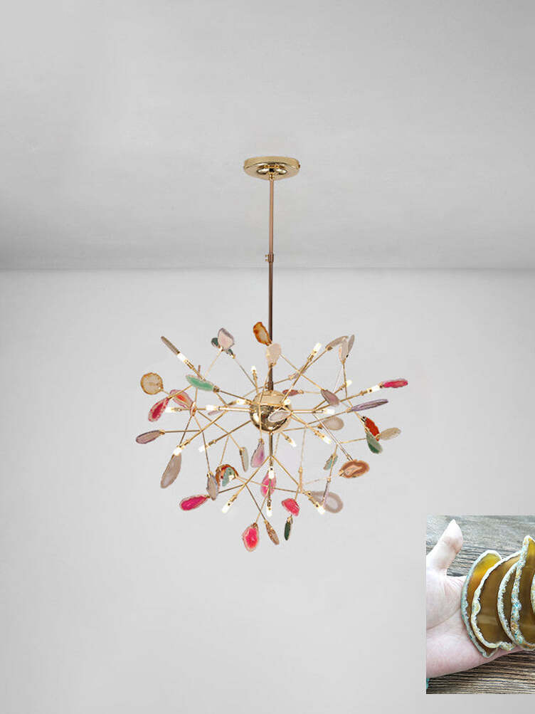 Radial multicoloured chandelier beneath a pale ceiling with a yellow stone sample inset