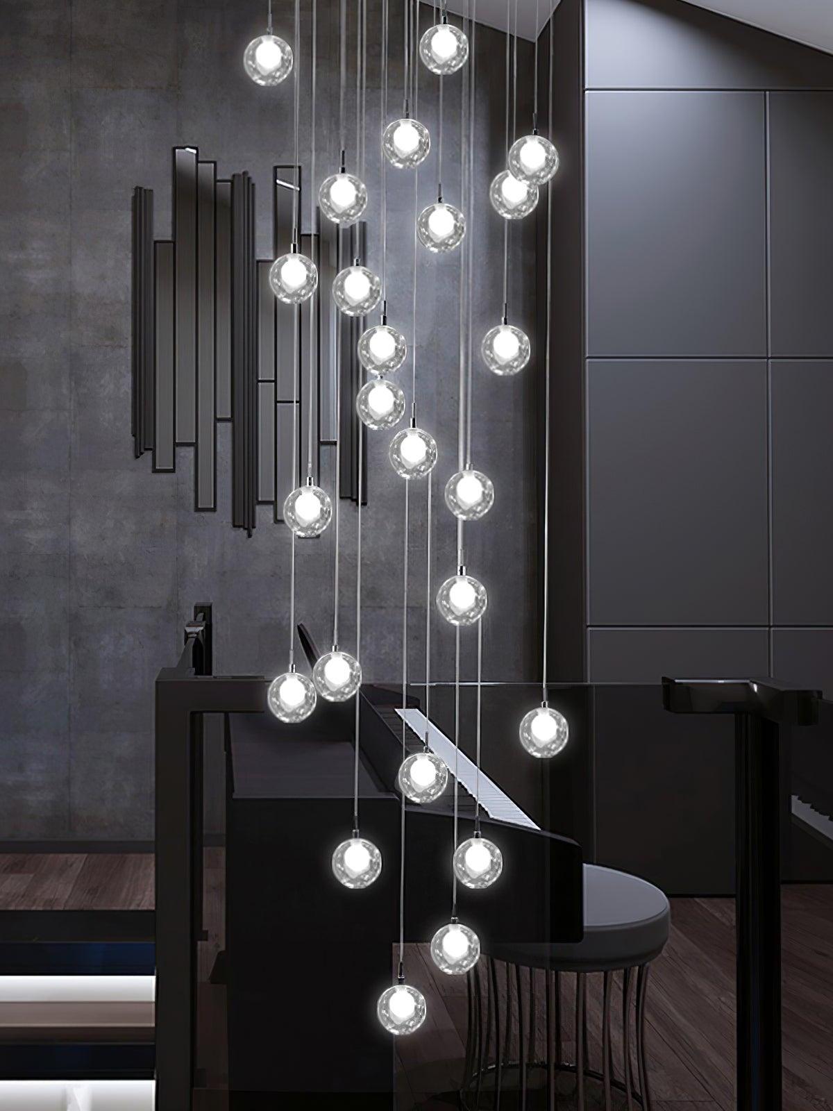 Many illuminated glass globes in dark stairwell