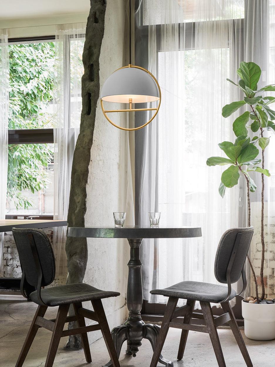 Black pendant by dining table and window