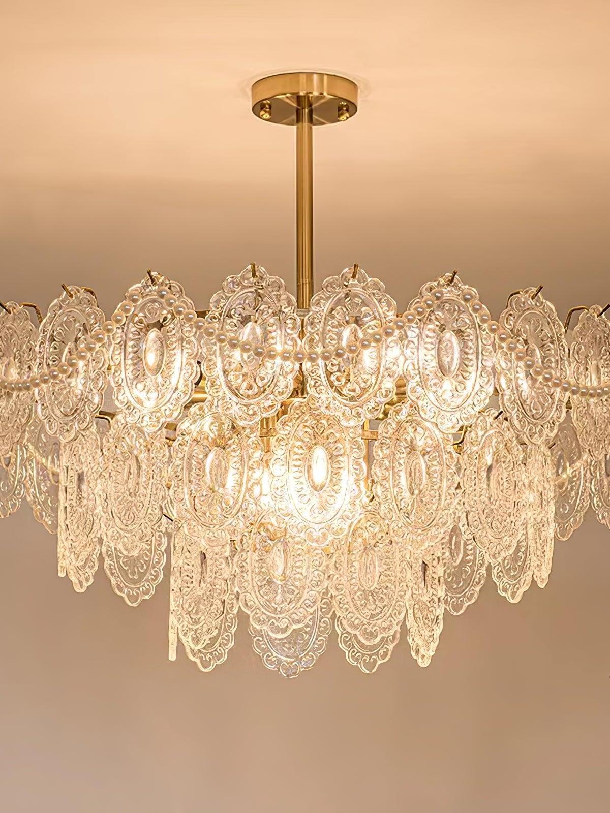 Glowing gold chandelier with tiered clear panels
