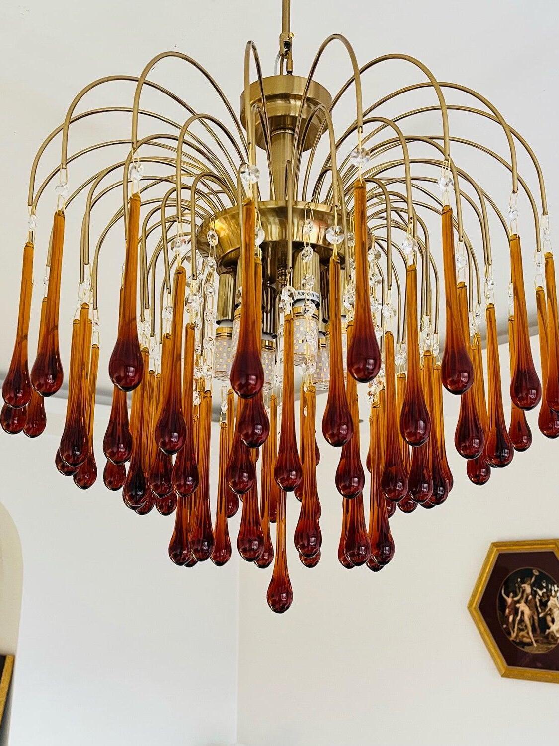 Elongated amber drops beneath curved stems