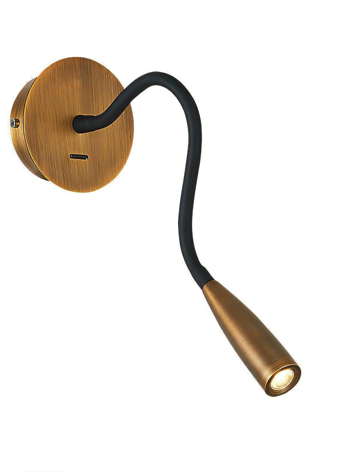 Brushed Bronze Flexi with round plate, switch, dark curved arm and illuminated tapered head on pale background