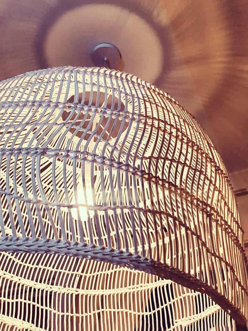 Close-up of natural rattan shade ribs and weave