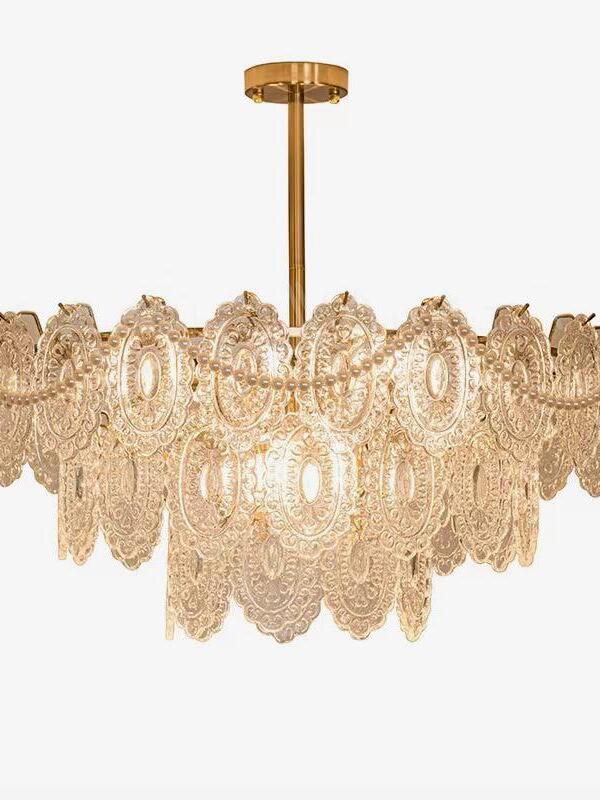 Layered clear glass chandelier on white background