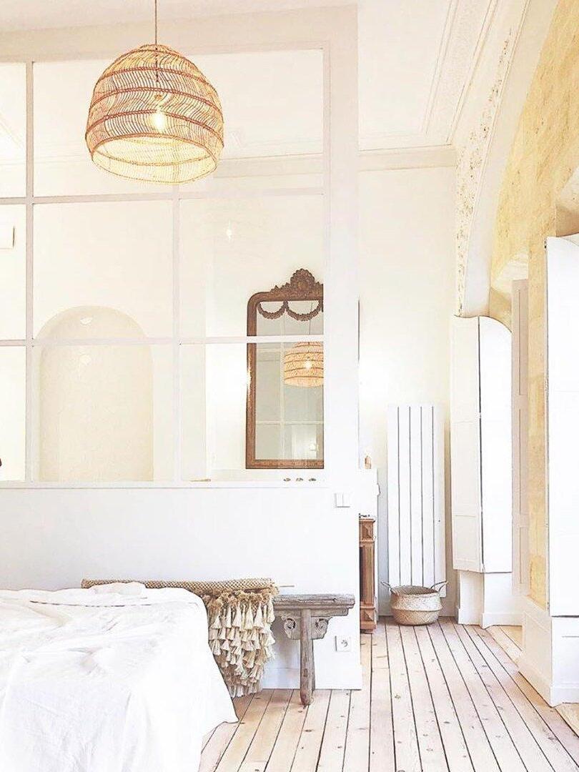 Woven pendant in a bright bedroom