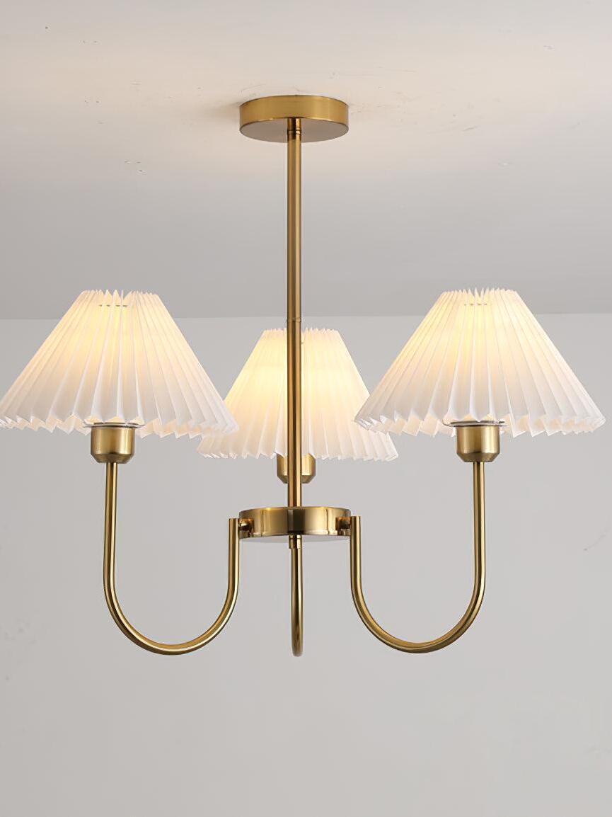 Lit three-shade Lenore chandelier with a round canopy and curved arms