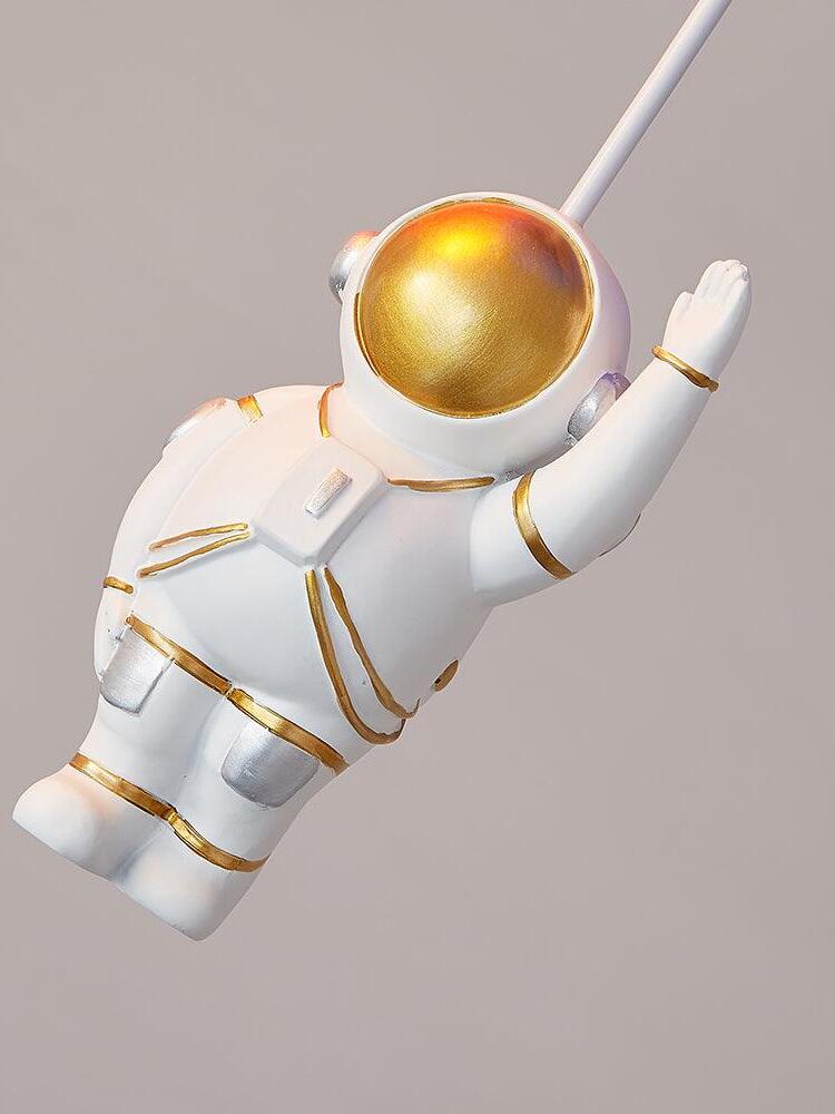 Hanging white astronaut ornament with gold-coloured visor