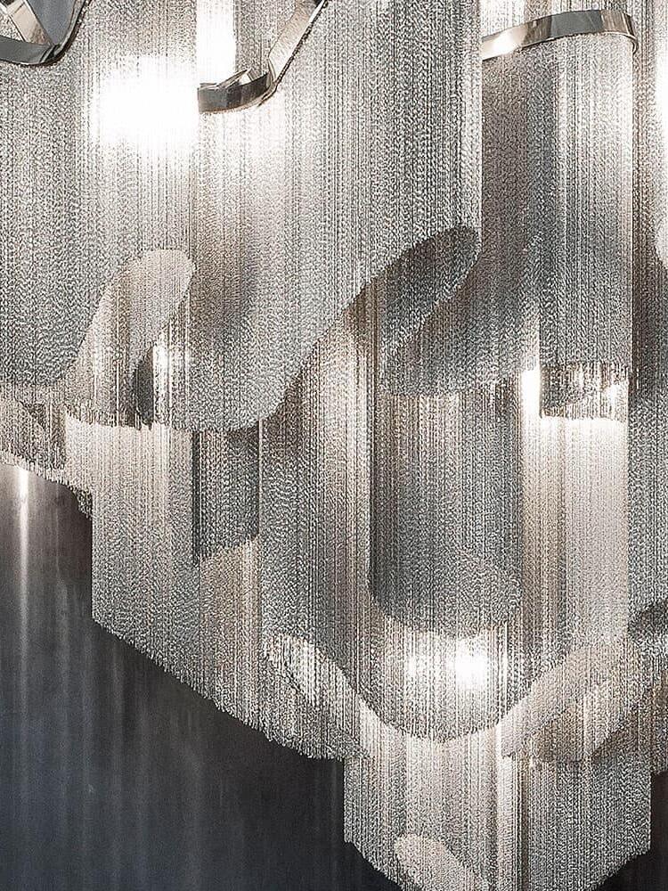 Wavy metal rails with fine cascading strands