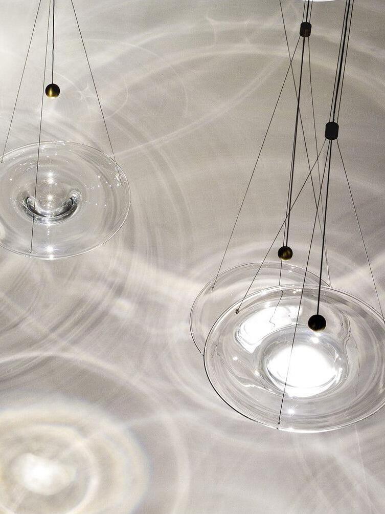 Overhead view of transparent discs and light rings