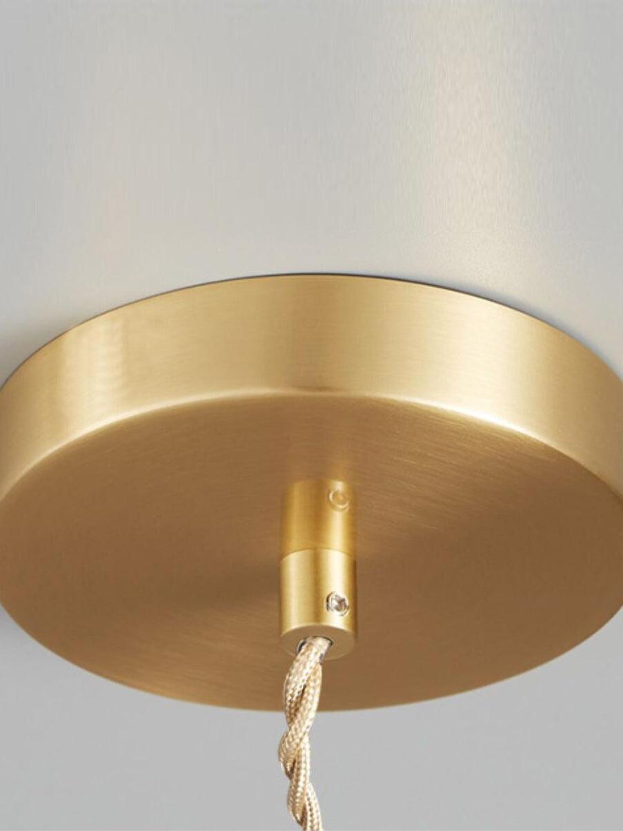 Round brass-colour ceiling canopy and braided cord