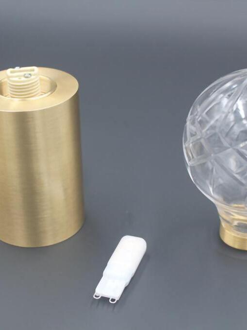Separated glass globe and base with loose loop-pin capsule bulb